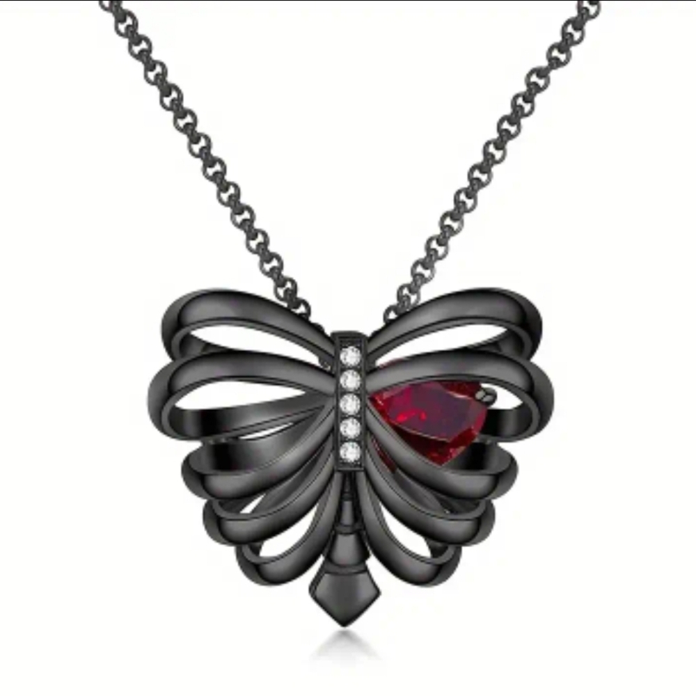 Black Metal Ribcage Goth Necklace With Red Heart Stone